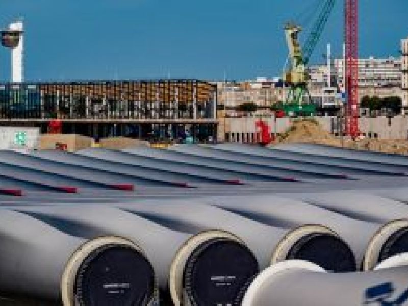 Rows of wind turbine components line the dock in Le Havre in France