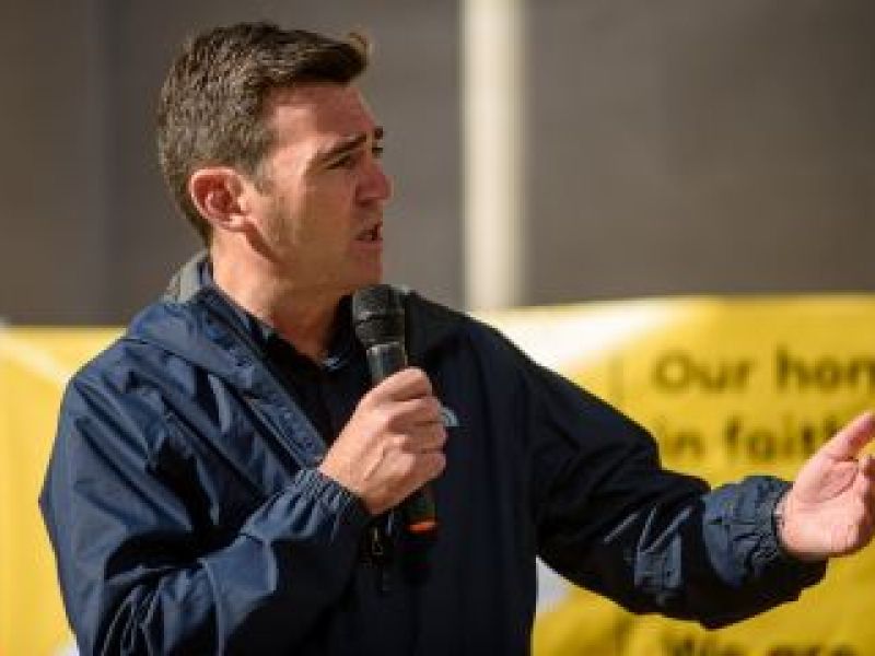 British MP Andy Burnham talking into microphone